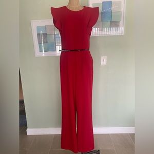 Women’s size 12 Red Calvin Klein jumpsuit with black belt.